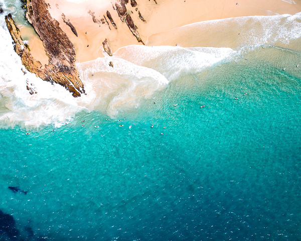 aerial drone shot of picturesque surf beach