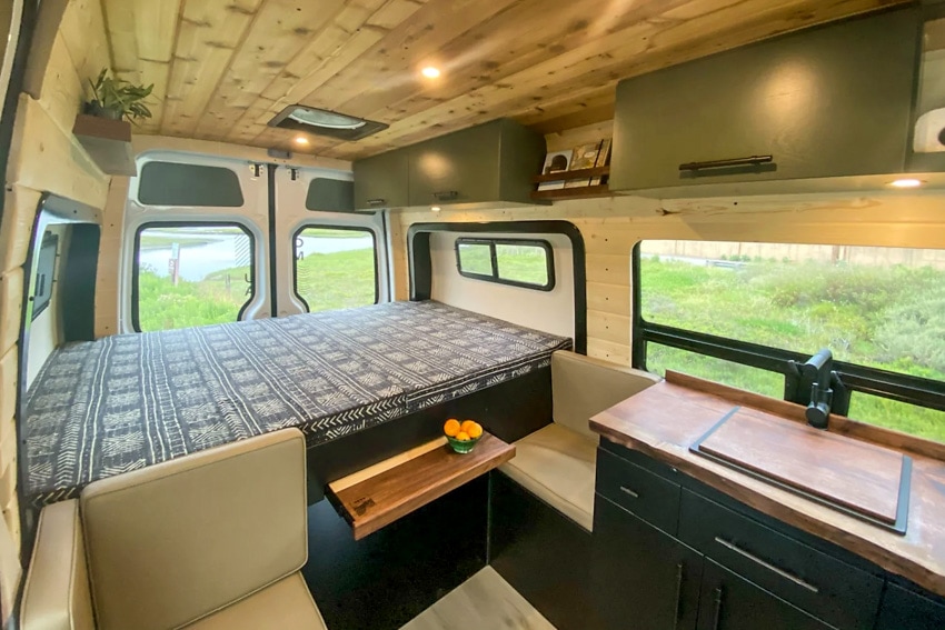 interior and bed setup of van rental