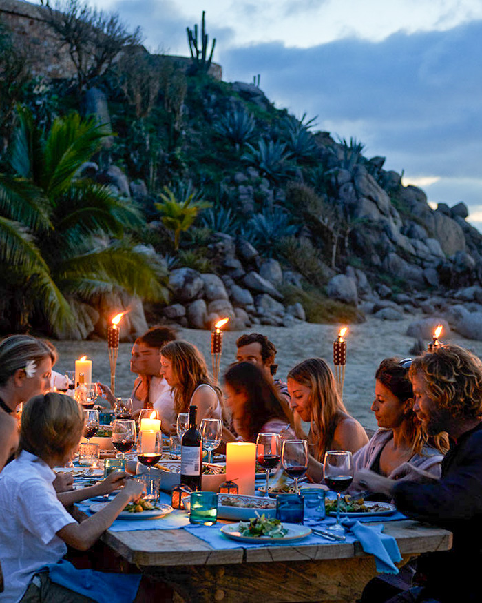 candlelit special occasion dinner on the beach