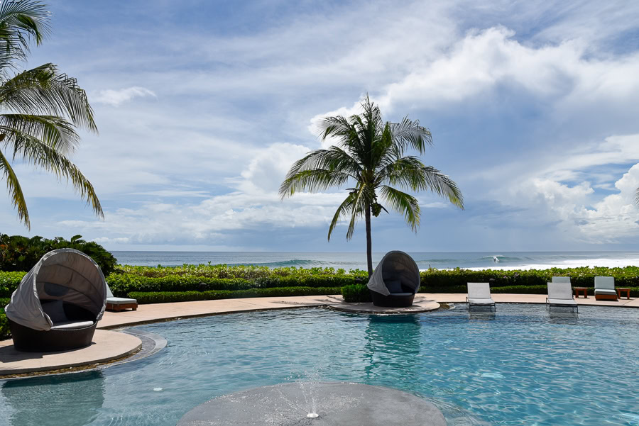 Rancho Santana poolside lounge with ocean views 