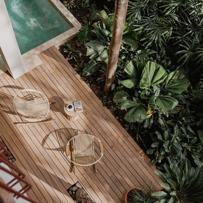 stunning wooden tropical deck, plunge pool, and design furniture