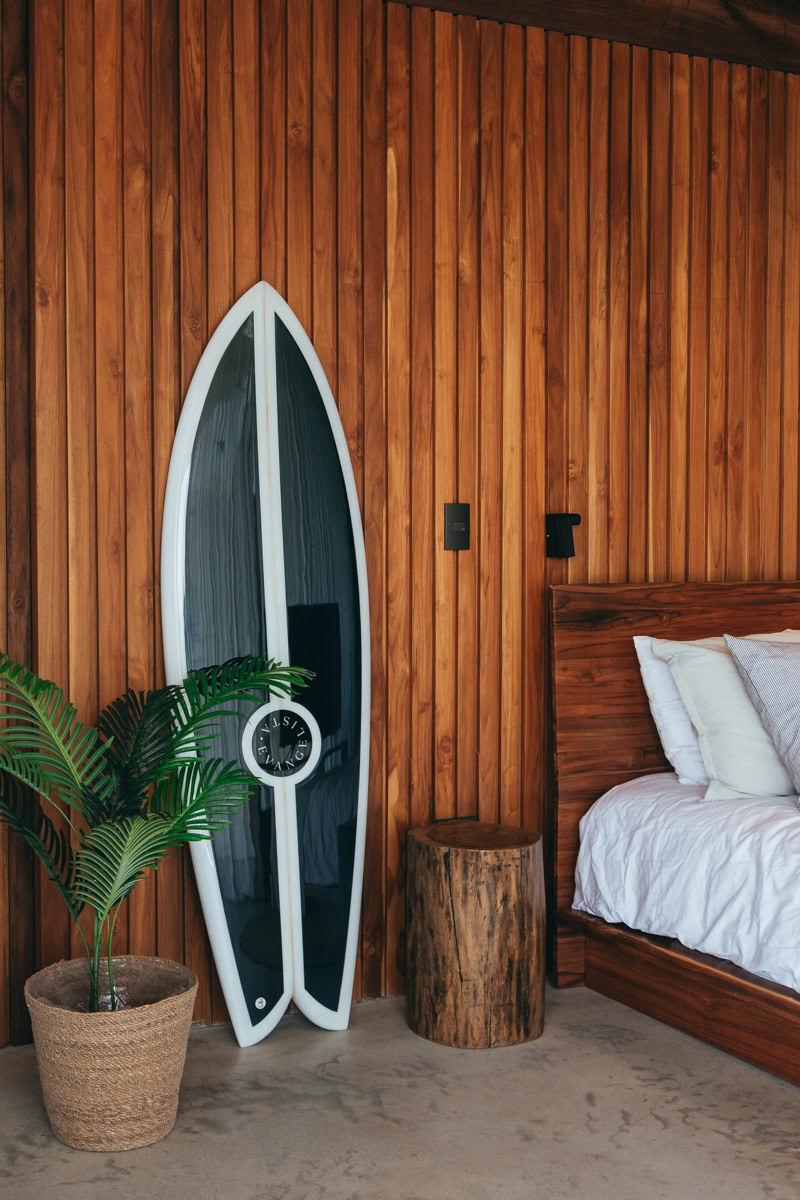 beautiful fish surfboard in boutique designer room