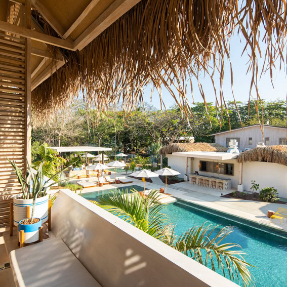 surf coaching trip boutique hotel pool