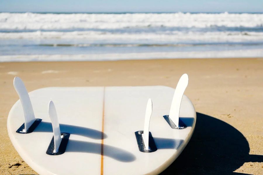 quad surfboard fins in ocean