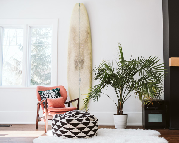 Surfboard hanging on wall