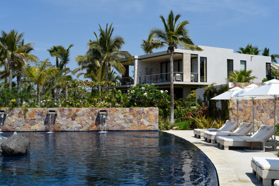 Susurros del Corazon Review / pool side with loungers at luxury resort in Punta de Mita, Mexico