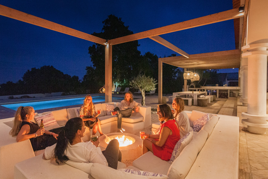 Evening fire pit at Tiny Whale Surf Lodge in Portugal.