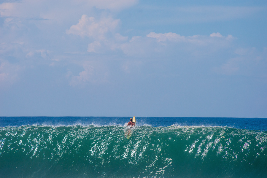 A surfer going over a wave at Zicatela, Puerto Escondido